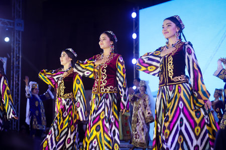 Bukhara, Uzbekistan - June 19, 2023: Group of Women Standing on Top of Stageのeditorial素材