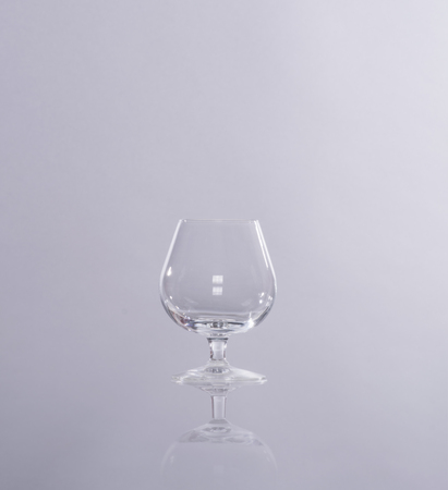 Empty cognac glassの写真素材