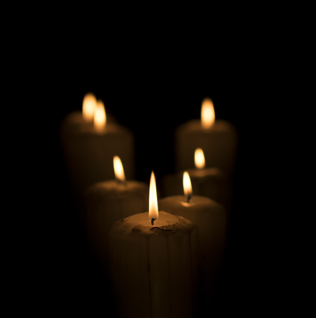 Moody candles with bokehの写真素材