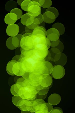 green Christmas lights bokehの写真素材