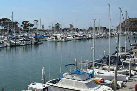 Luxury boats at anchor in Dana Point Harbor, California