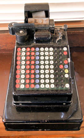 antique 90 key electric adding machine with paper tapeのeditorial素材