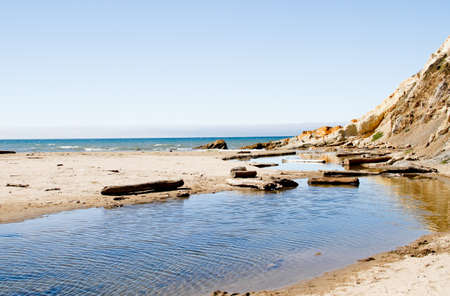 blue fresh water Russian river meeting green california coastal waterの写真素材