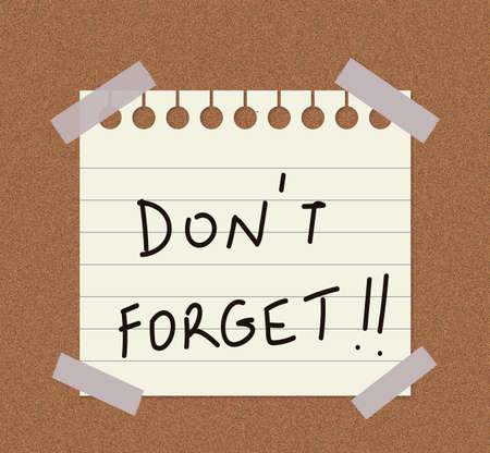 Notebook page on cork backgroundの写真素材