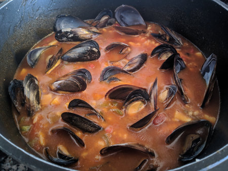 Typical spanish seafood paella in traditional pan