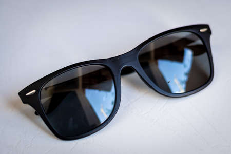 black wayfarer sunglasses on white backgroundの写真素材