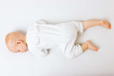 Sleeping angel boy with wingsの写真素材