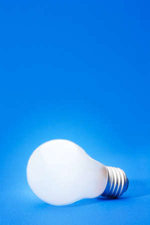 light bulb on blueの写真素材