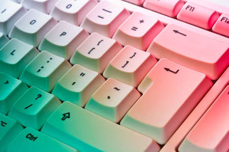 Computer Keyboard lit with colored studio gelsの写真素材