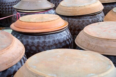 Jar with soy sauce waiting for maturingの写真素材