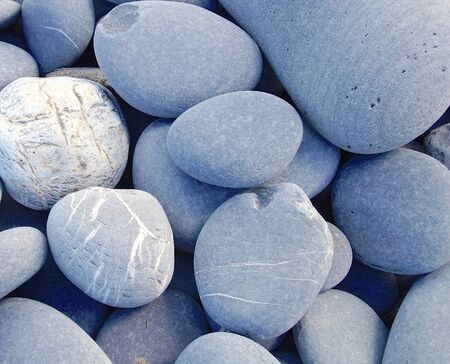 The hard pebbles closeup on the beachの写真素材
