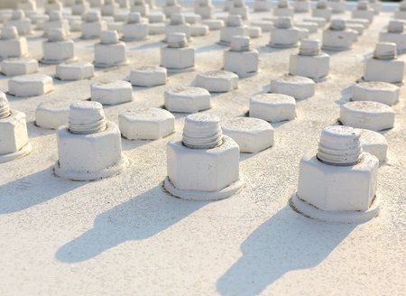 Closeup of big bolt and nut on bridgeの写真素材