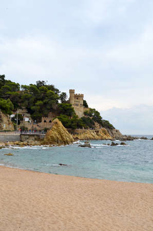 View of the beach and the castle of Lloret de Mar Costa Brava
