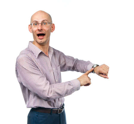 Emotional young man shows at wristwatches