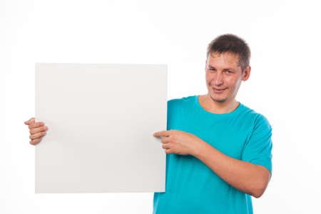 Young man with a blank boardの写真素材