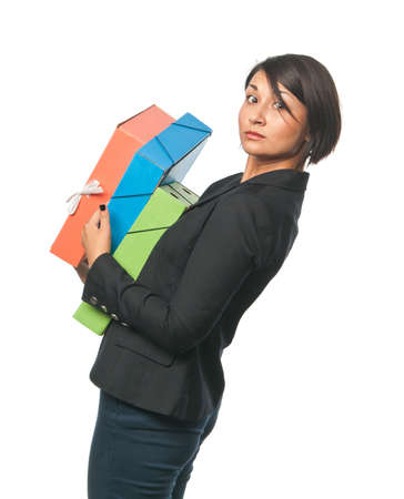Young businesswoman with big paper foldersの写真素材