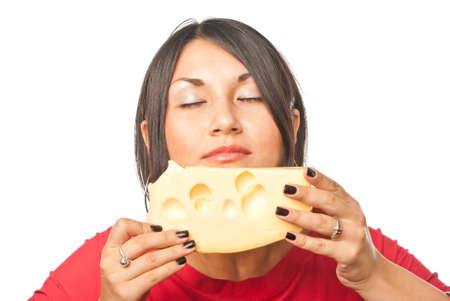 Pretty girl with a big piece of cheeseの写真素材