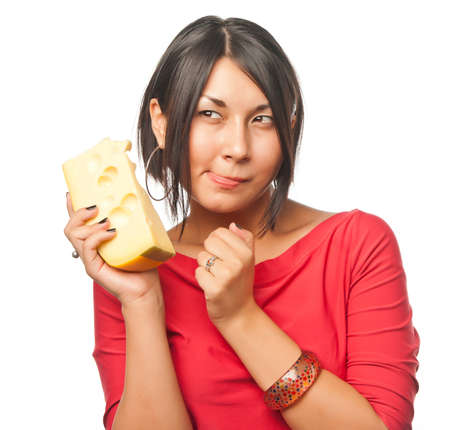 Pretty girl with a big piece of cheeseの写真素材