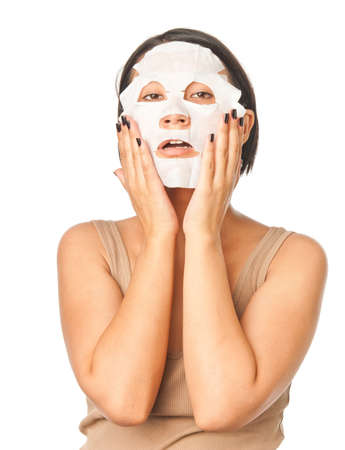 Girl in a cosmetic maskの写真素材