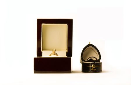 Wedding rings and the box on a white backgroundの写真素材