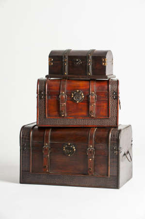 three old trunks made of woodの写真素材