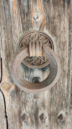 Ring detail in a door of the Los Serrano tower in Valenciaの写真素材
