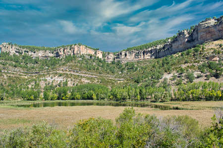 Mountainous ledge in the UÃ±a lagoon, Cuencaの写真素材