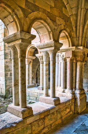 Romanesque columns, capitals and arches in the cloister of the Cistercian monastery of Santa MarÃ­a la Real in Aguilar de Campoo, Spainの写真素材