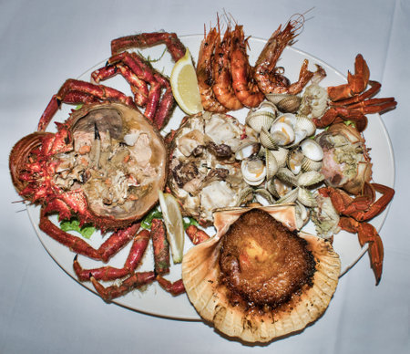Tasty seafood with spider crab, prawns, clams, scallop and crabの写真素材