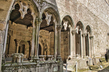 Colonnade and gothic arches in the ruins of the San Domingos convent in Pontevedra, Spainのeditorial素材