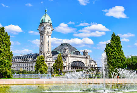 Campo de Juillet and railway station with its beautiful clock tower in Limoges, Franceのeditorial素材