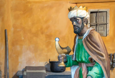 King Baltasar with oil lamp in the representation of the Nativity Scene of the Valladolid town hall, Spainの写真素材