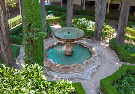 Fountain in the gardens of the Mirador de la Reina in the Nasrid Palaces of the Alhambra, Granadaのeditorial素材