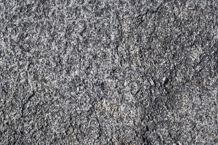Outdoor aged rough and rough granite stone textureの写真素材