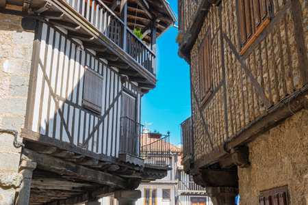 Traditional architecture of stone and clapboard houses in the beautiful medieval village of La Alberca, Spainの写真素材