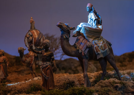 Nativity scene figure for Christmas. The wise man Balthazar riding a camel. Bible, decoration, religionの写真素材