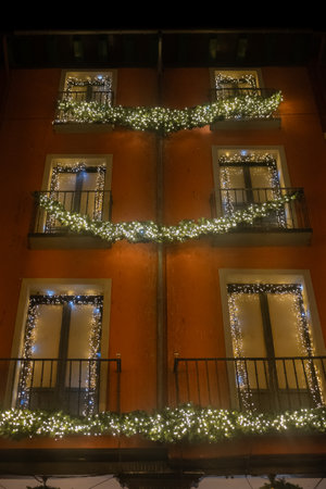 Christmas lights on balconies in the main square of Valladolid, Spainの写真素材