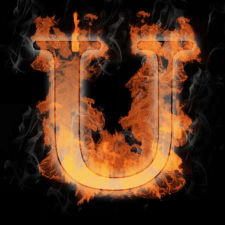 Burning Letter with true flames and smokeの写真素材