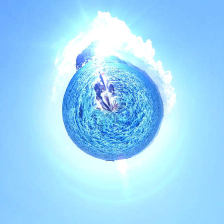 Abstract globe with beach and city skyline at sunset!の素材