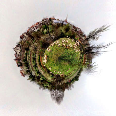 Abstract globe with farm and sheeps at sunset!