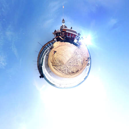 Abstract globe with beach and city skyline at sunset!の素材