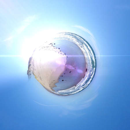 Abstract globe with beach and city skyline at sunset!の素材