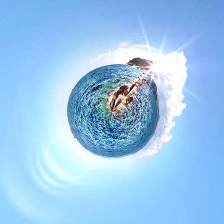 Abstract globe with beach and city skyline at sunset!