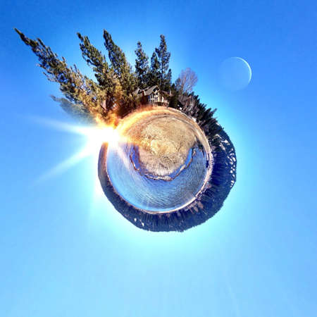 Abstract globe with beach and city skyline at sunset!の素材