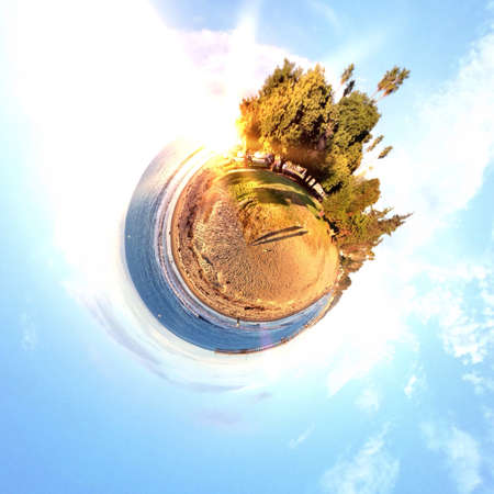 Abstract globe with a natural landscape viewの素材