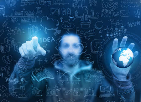Man touching a glass panel full of informations and graphs. Idea to show business infographics conceptの写真素材