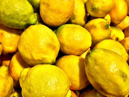 Close up of a big box of Lemons at the super market in vegetables section.の写真素材
