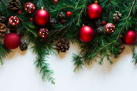 Merry Christmas Frame with real wood green pine, colorful baubles, gift boxe and other seasonal...