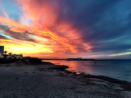 Beatiful Sunny Beach day in Formentera Spain in the middle of the holiday summer season.の写真素材
