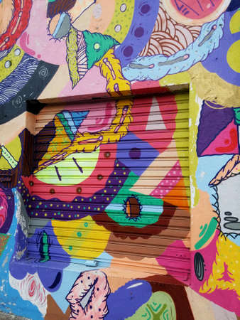 Sao Paulo, Sao Paulo, Brazil; 11/22/2014: Colorful mural of street art with abstract expressions and psychedelic figures located in Batman Alley or Beco do Batman, a street with graffiti in Sao Pauloのeditorial素材